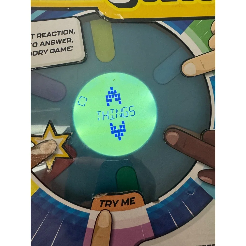 Press to Guess Electronic Party Game by‎ Buffalo Fast Reaction Category Game
